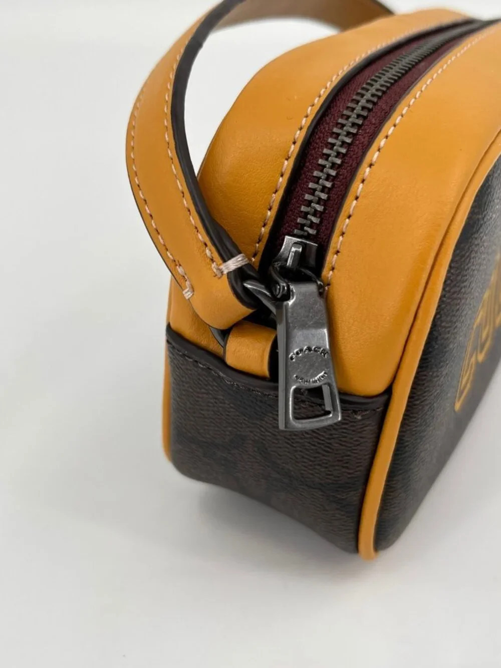 Coach Jamie Wristlet In Signature Canvas With Varsity Motif QB/Brown/Buttercup